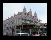 The ''Pink building'' is quite a landmark, and houses part of a very large, upscale, modern shopping center.